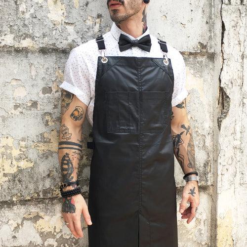 Por que um avental preto?