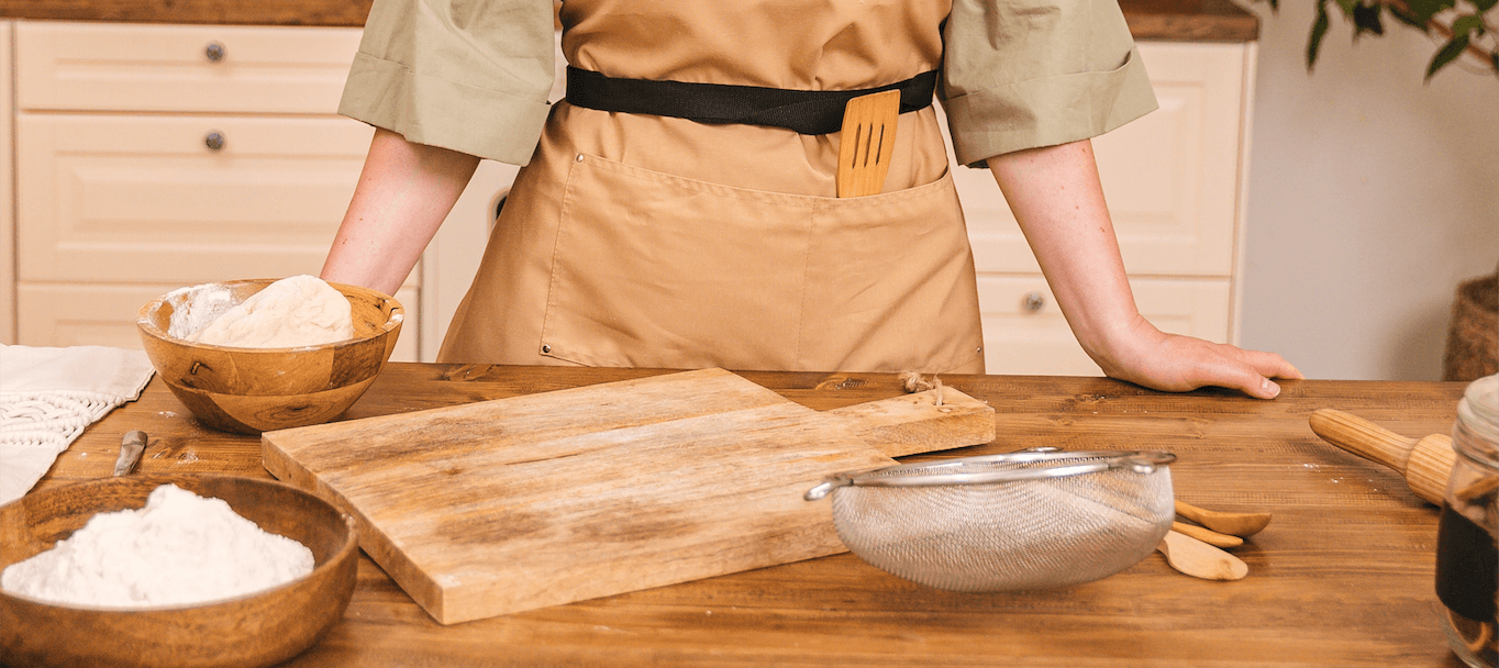 woman wearing apron in the kitchen