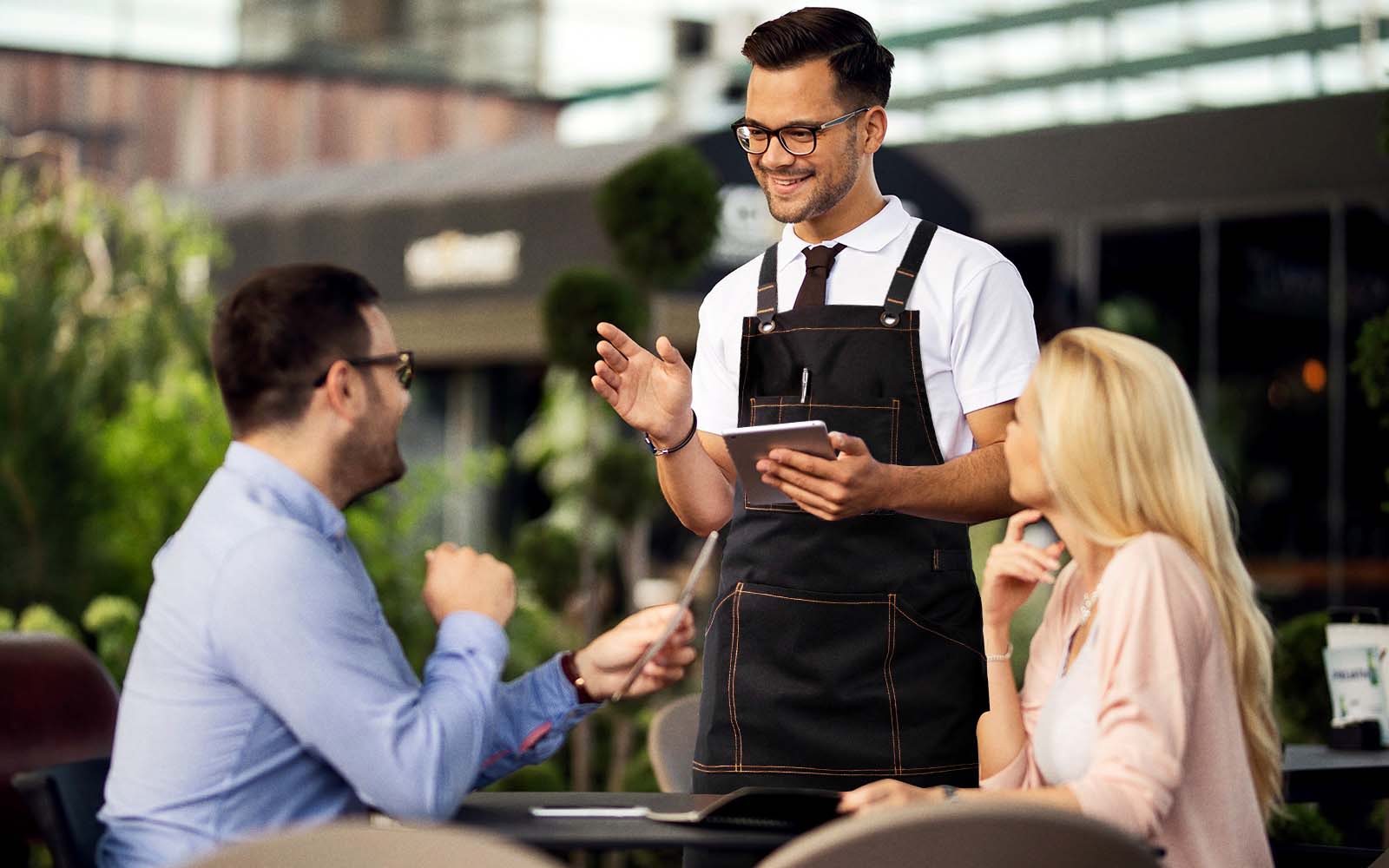 Waiter with custom Under Ny Sky uniform